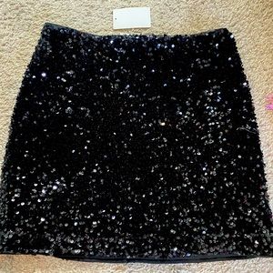 Black sequin mini skirt